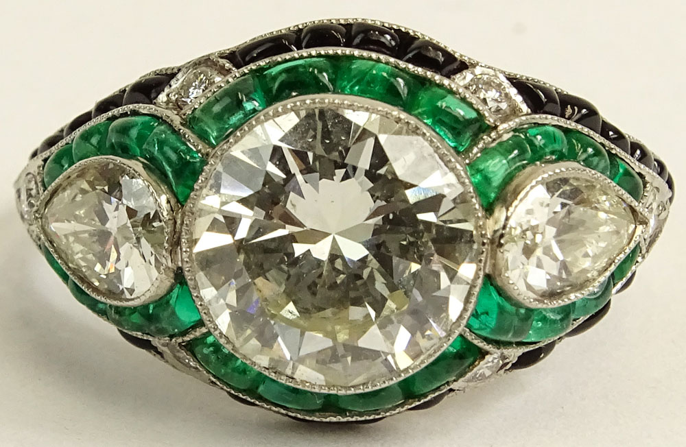 Very Fine Art Deco Design Approx. 4.25 Carat Cut Diamond, 1.50 Carat Colombian Emerald and Platinum Engagement Ring. 
