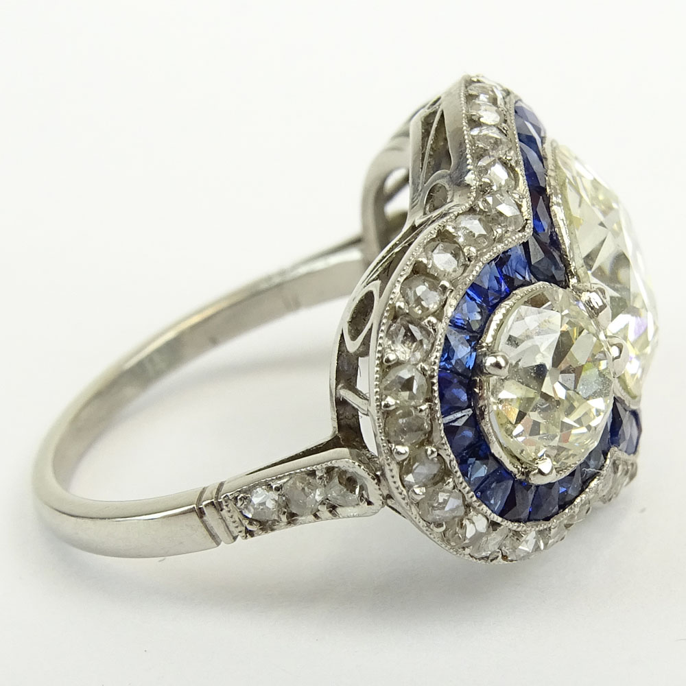 Stunning Art Deco Design Approx. 3.51 Carat Center Stone European Cut Diamond, Sapphire and Platinum Three Stone Engagement Ring.