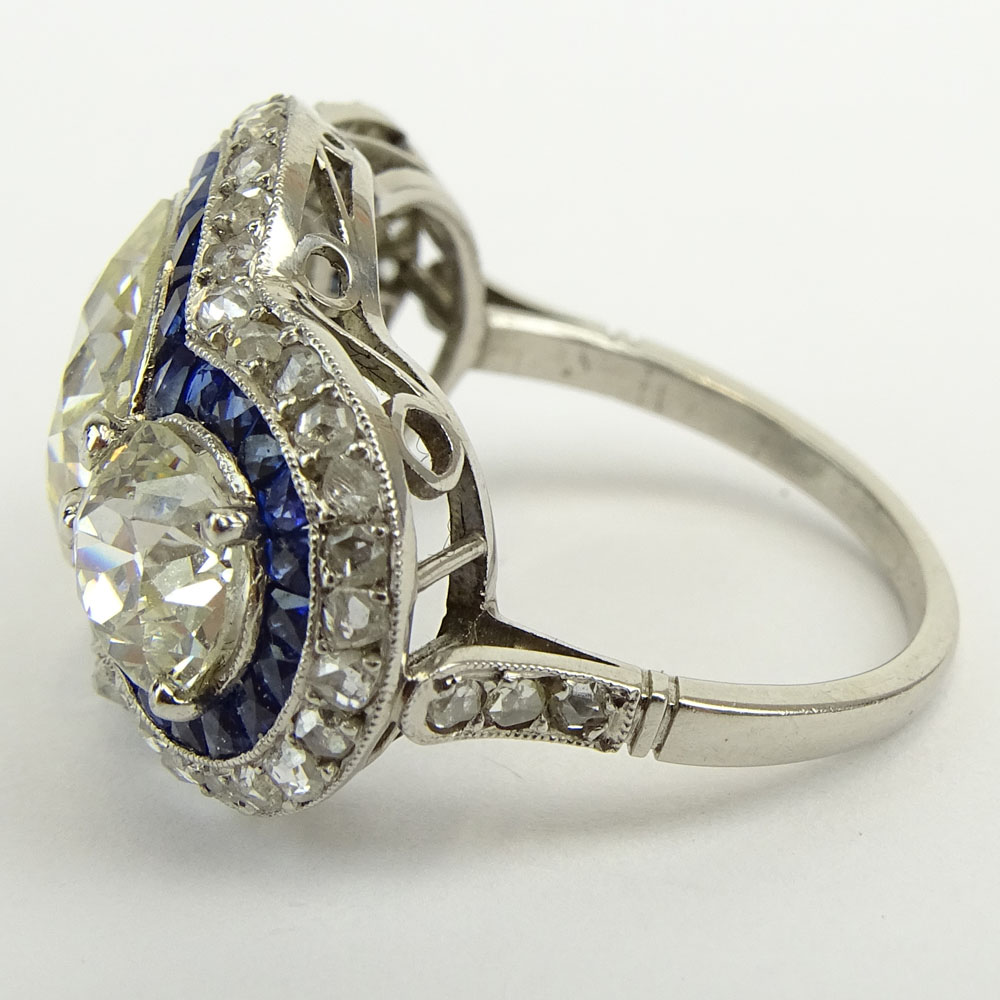 Stunning Art Deco Design Approx. 3.51 Carat Center Stone European Cut Diamond, Sapphire and Platinum Three Stone Engagement Ring.