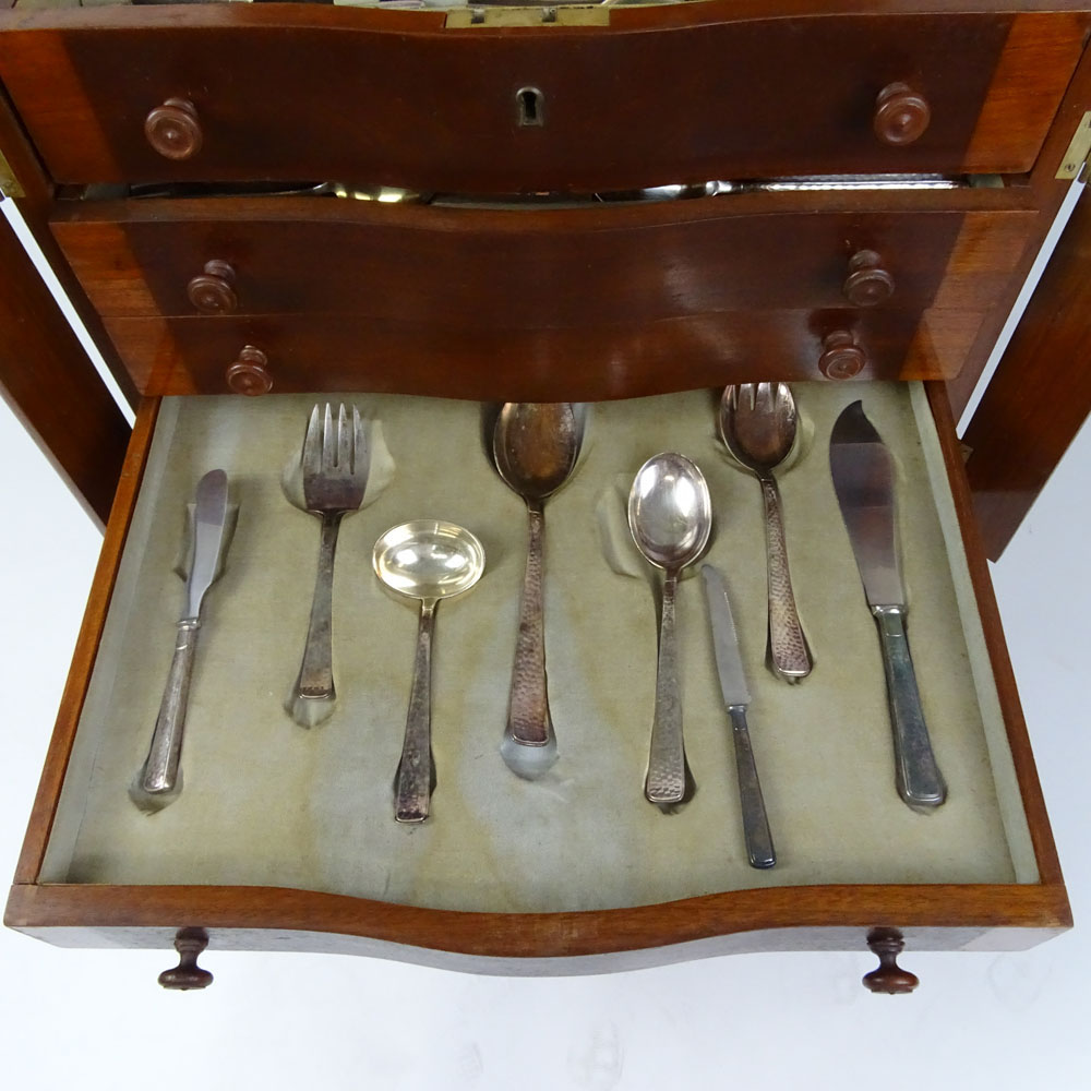 One Hundred Eighty Four Piece Arts & Crafts Sterling Silver Flatware in Fitted Custom Cabinet.