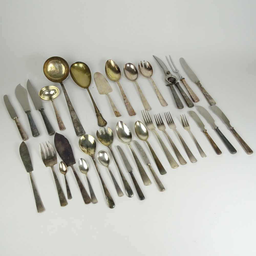 One Hundred Eighty Four Piece Arts & Crafts Sterling Silver Flatware in Fitted Custom Cabinet.