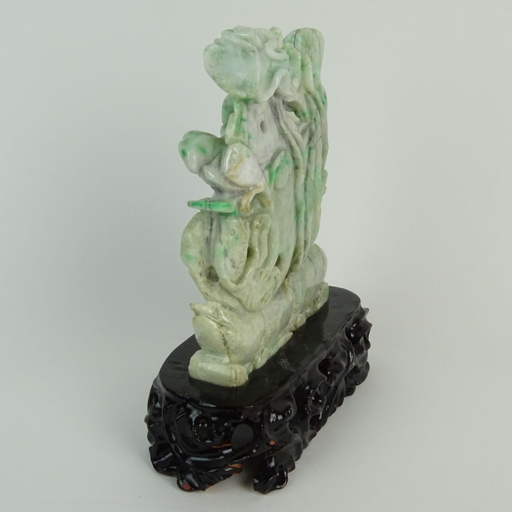 Chinese Jadeite Jade on Stand, Fish and Lotus Flower Motif. Carved hardwood stand.