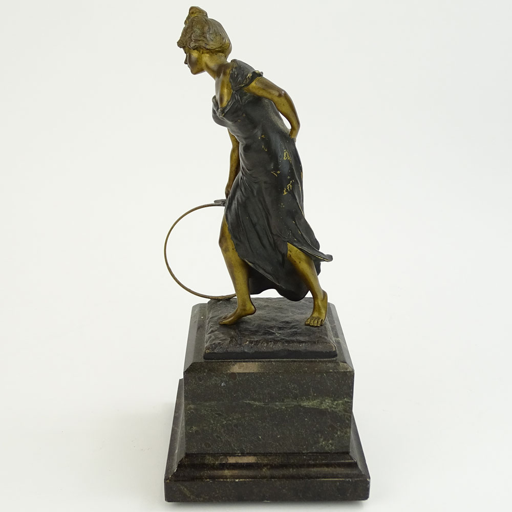Paolo Ferrari, Italian (19/20th C) Patinated bronze sculpture on marble base "Girl With Hoop" 
