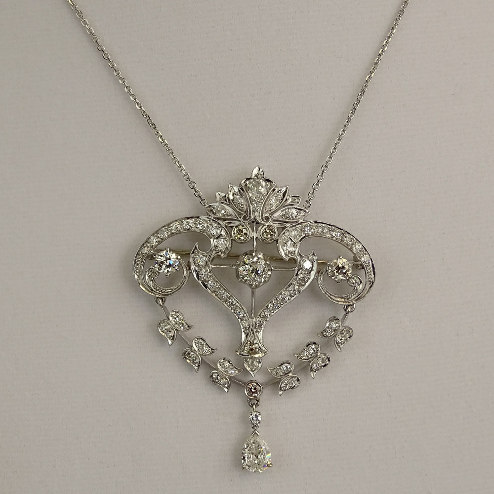 Art Deco Approx. 5.50 Carat Diamond and Platinum Pendant/Brooch with 14 Karat White Gold Chain.