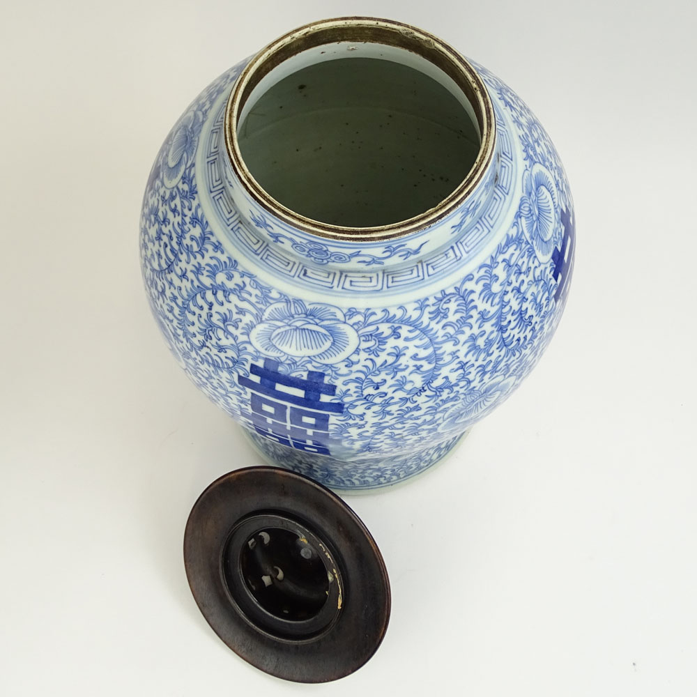 Chinese Qing Dynasty 19th Century Blue and White Porcelain "Double Happiness" Jar with later Carved Wood Lid.