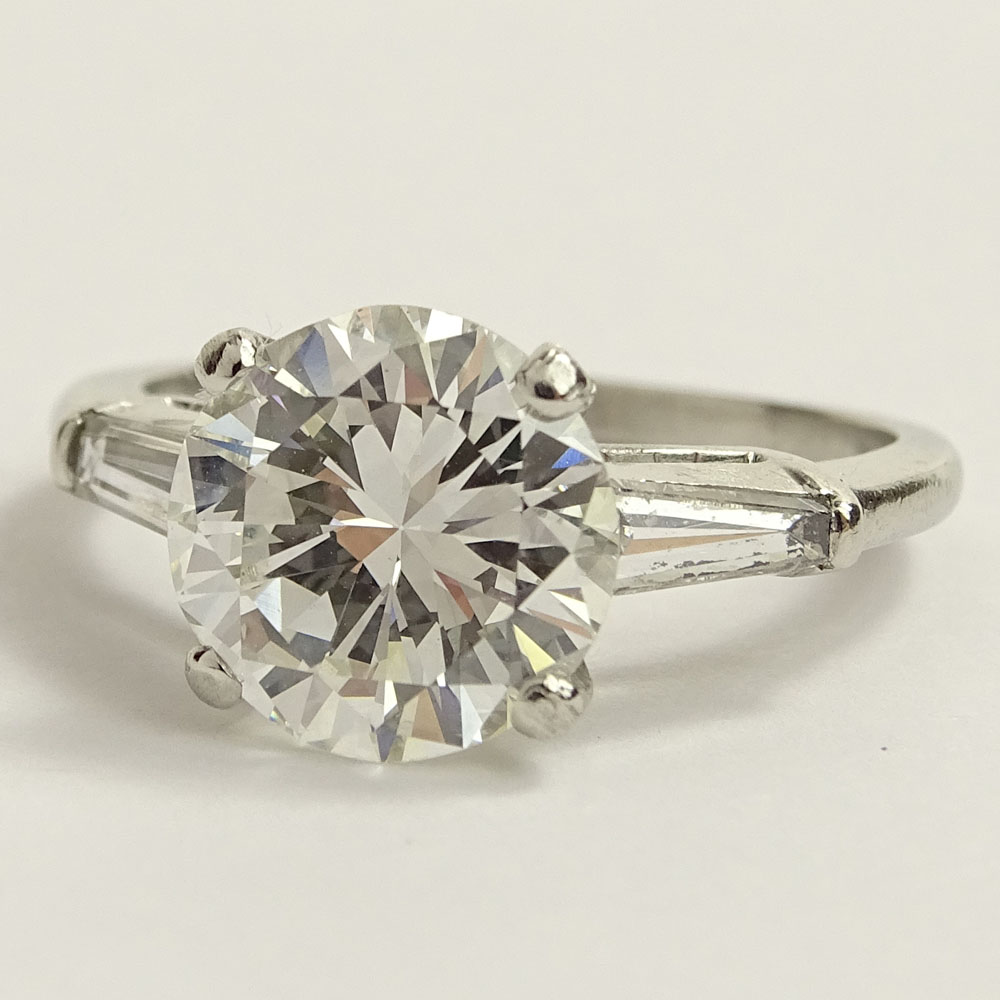 GIA Certified 3.25 Carat Round Brilliant Cut Diamond and Platinum Engagement Ring.