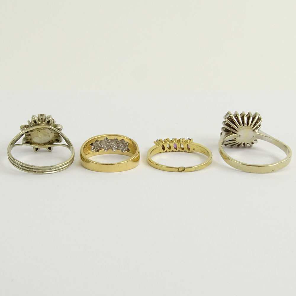 Collection of Four (4) Diamond and Gemstone Rings