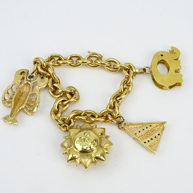 Vintage Italian 18 Karat Yellow Gold Charm Bracelet with One (1) 18 Karat Yellow Gold Charm (elephant) and Three (3) 14 Karat Yellow Gold Charms