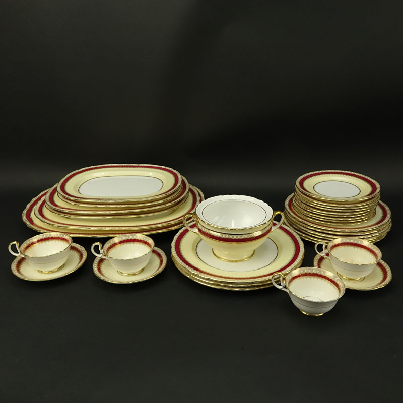 Thirty Two (32) Piece Aynsley Maroon and Gilt Porcelain Scalloped Edge Dinnerware