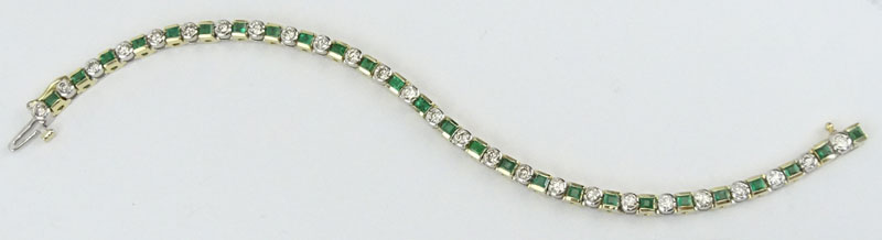 2.10 Carat Round Brilliant Cut Diamond, 2.50Carat Square Cut Emerald and 14 Karat Yellow and White Gold Line Bracelet. 