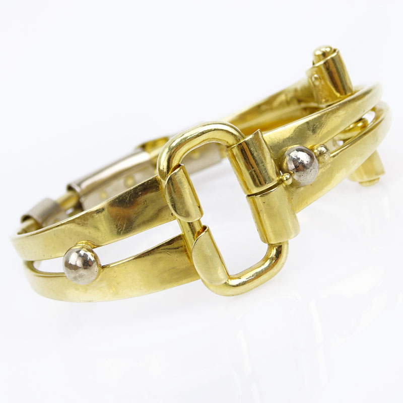 Amitai Kav, Israeli Circa 1995 Heavy 18 Karat Yellow and White Gold Modern Design Folding Horse Bit style Bracelet