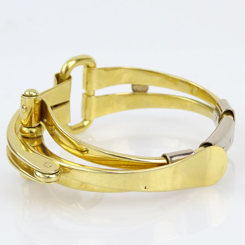 Amitai Kav, Israeli Circa 1995 Heavy 18 Karat Yellow and White Gold Modern Design Folding Horse Bit style Bracelet