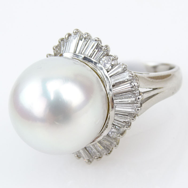 Vintage style 14mm South Sea Pearl, 1.37 Carat Tapered Baguette Cut Diamond and Platinum Ring.