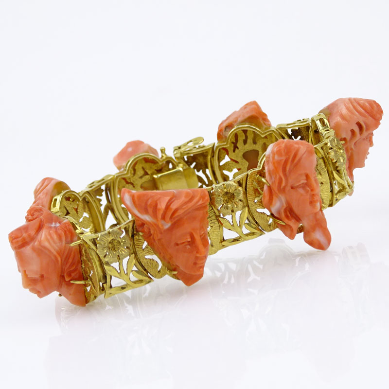 Vintage Carved Coral and 14 Karat Yellow Gold Bracelet Set with Seven Relief Carved Cameos