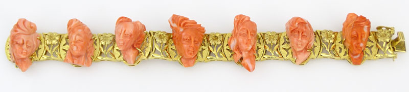 Vintage Carved Coral and 14 Karat Yellow Gold Bracelet Set with Seven Relief Carved Cameos
