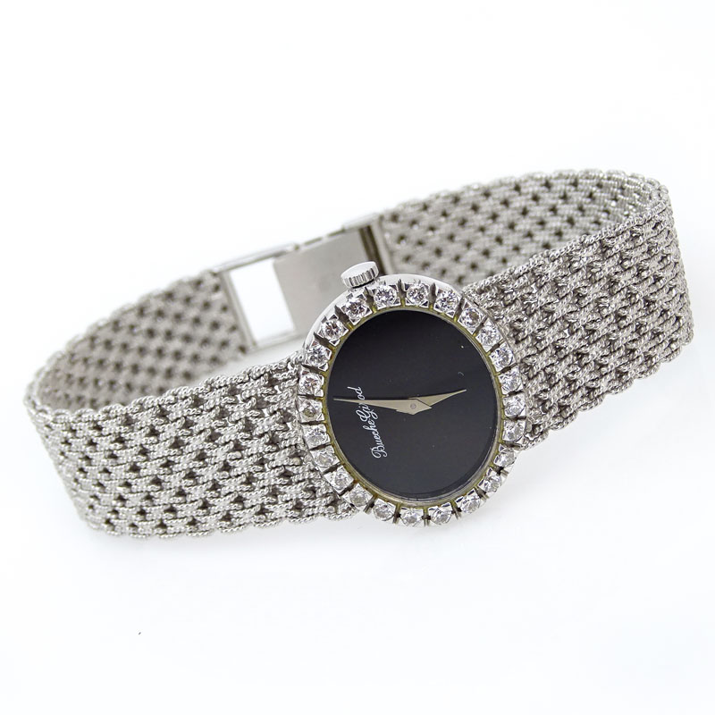 Lady's 18 Karat White Gold Bueche-Girod Bracelet Watch with Diamond Bezel and Manual Movement