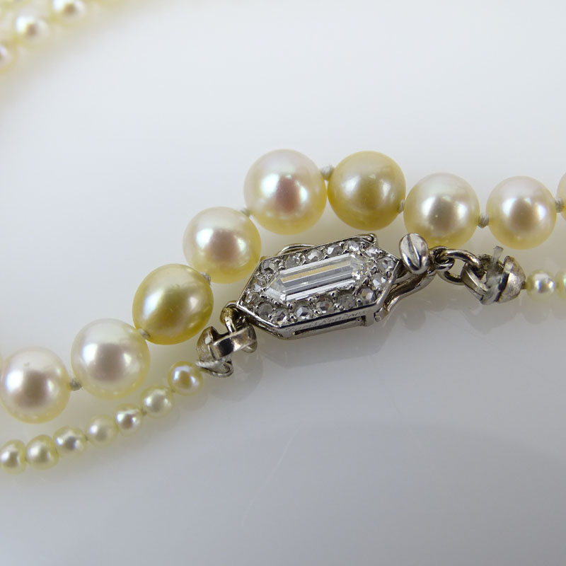 Exquisite Cartier GIA Certified Art Deco Graduated Natural Saltwater Pearl Necklace with Platinum and Diamond Clasp