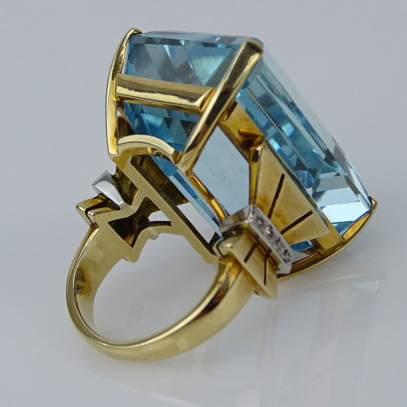 60.0 Carat Emerald Cut Aquamarine, 14 Karat Yellow Gold and Platinum Ring. 