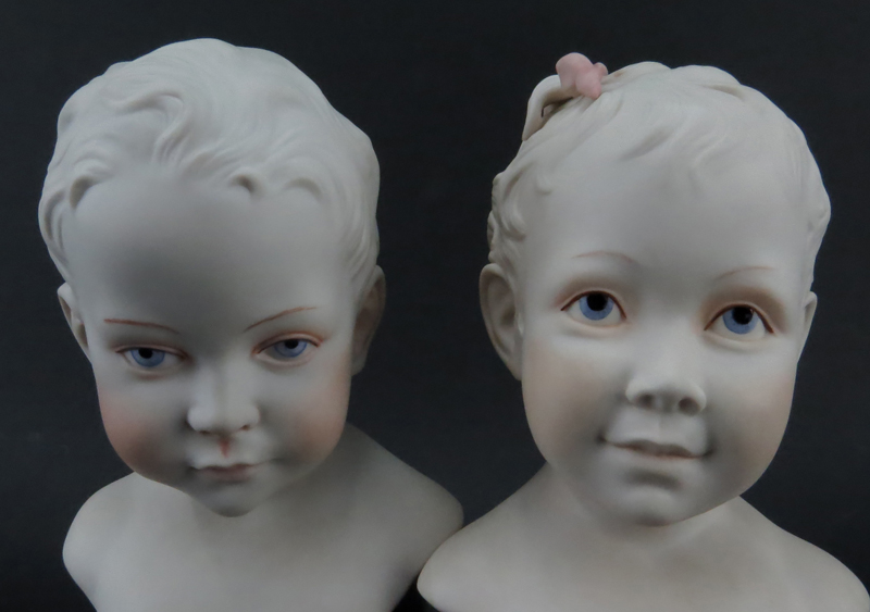 Pair of Cybis Polychrome Young Baby Boy and Girl Porcelain Busts Mounted on Wooden Bases