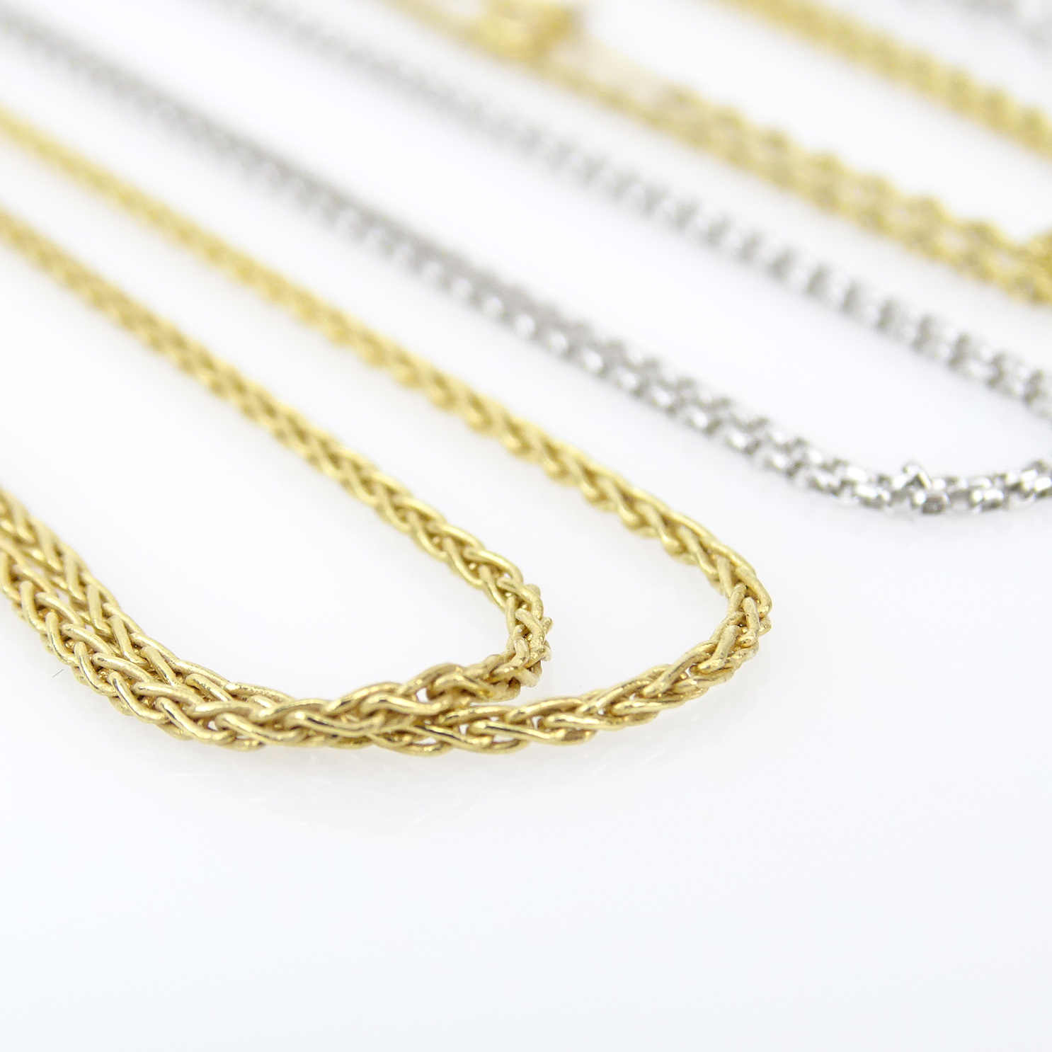 Four (4) 14 Karat Gold Chains Including Two (2) White Gold and Two (2) Yellow Gold