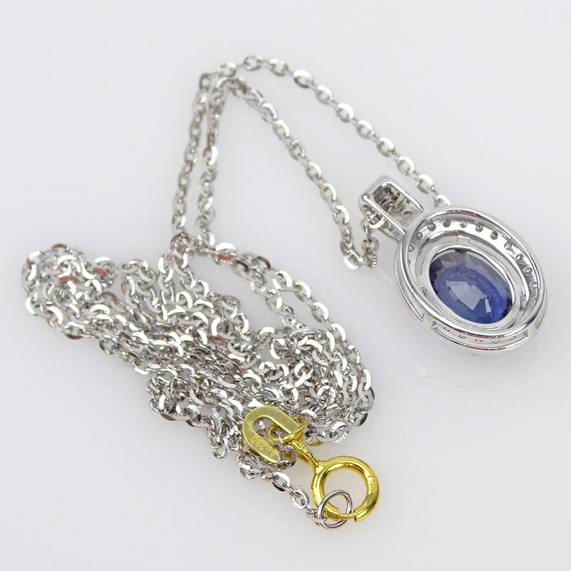 1.27 Carat Oval Cut Natural Unheated Change Color Sapphire, Diamond and 18 Karat White and Yellow Gold Pendant Necklace.