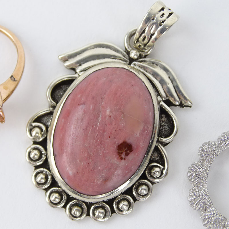 Four (4) Piece Sterling Silver Jewelry Lot Including a Manatee Bracelet, Ring, Vermeil Ring with Pink Stones and a Pendant with Pink Stone