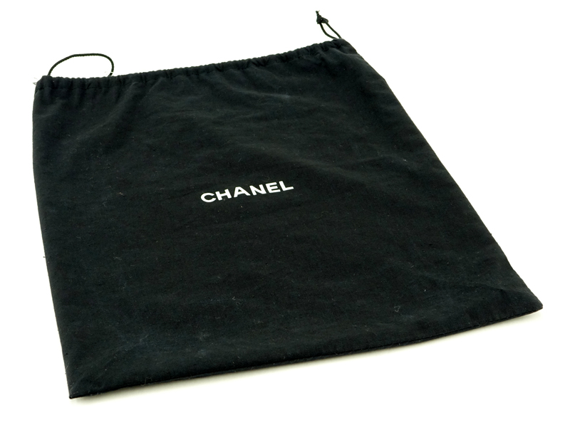 Chanel Pink & White Canvas Tote. Matte gold hardware, "Chanel" fabric interior with zipper pocket. Labeled appropriately. 