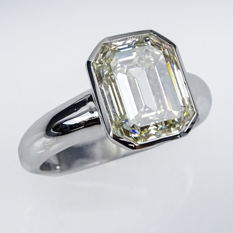 Approx. 5.0 Carat Emerald Cut Diamond and 18 Karat White Gold Engagement Ring.