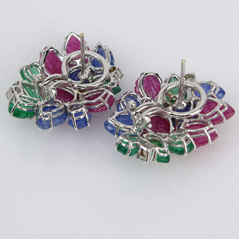 Cartier style Carved Emerald, Sapphire, Ruby, Round Brilliant Cut Diamond and 18 Karat White Gold Tutti Frutti Earrings. 