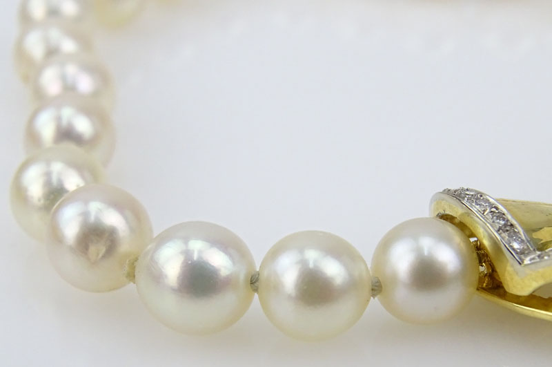 Vintage 6-8mm Pearl, Diamond and 18 Karat Yellow Gold Pendant  Necklace. 
