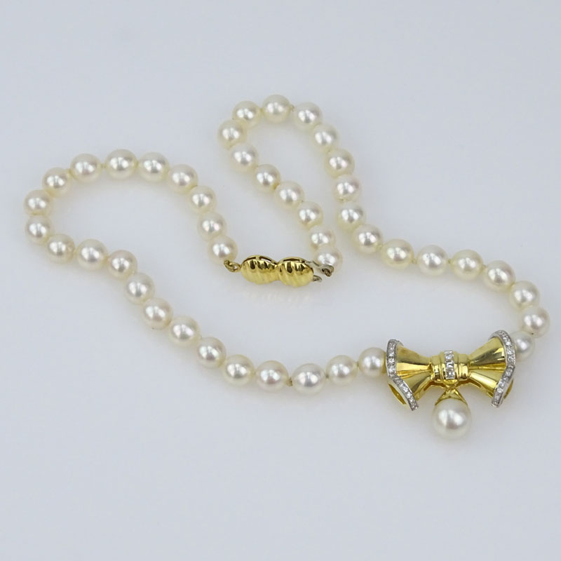 Vintage 6-8mm Pearl, Diamond and 18 Karat Yellow Gold Pendant  Necklace. 