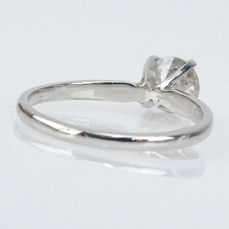Vintage Approx. .75 Carat Round Brilliant Cut Diamond and 14 Karat White Gold Solitaire Engagement Ring.