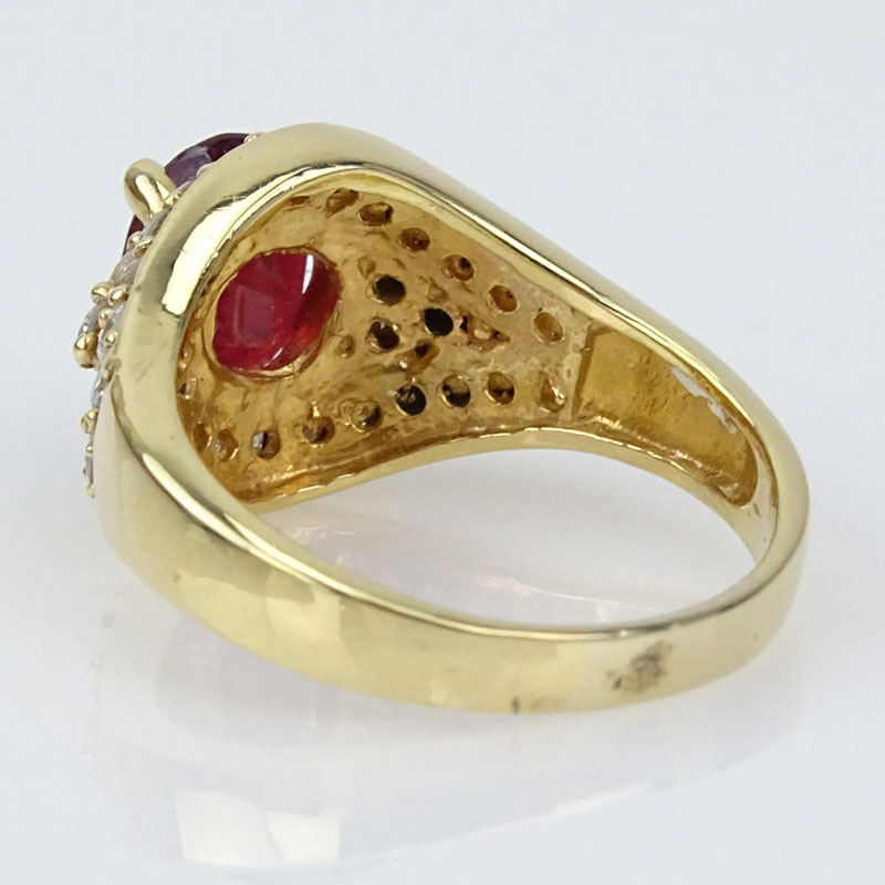 Vintage Oval Cut Ruby, Diamond and 14 Karat Yellow Gold Ring. 