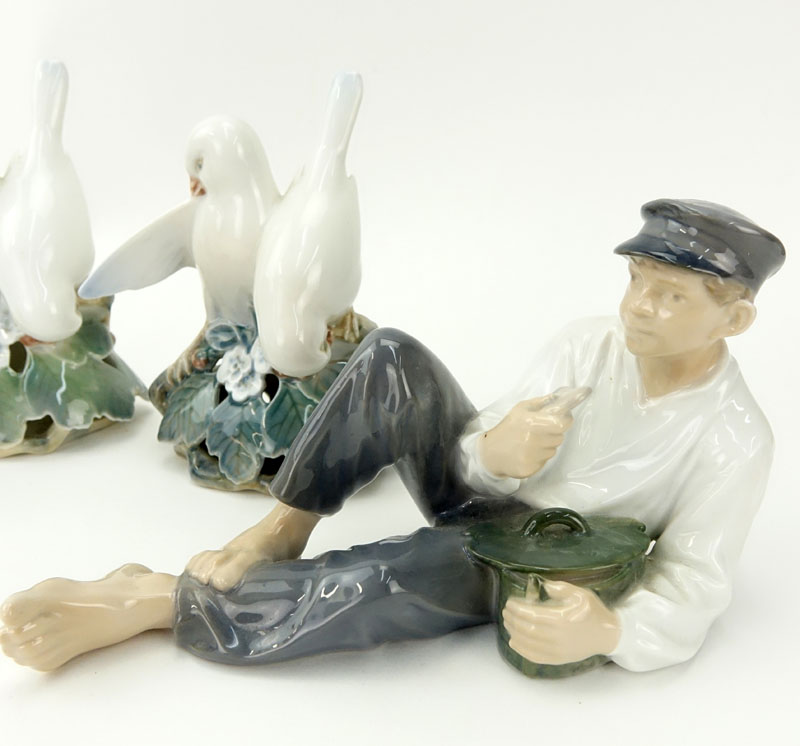 Collection of Four (4) Royal Copenhagen Figurines.