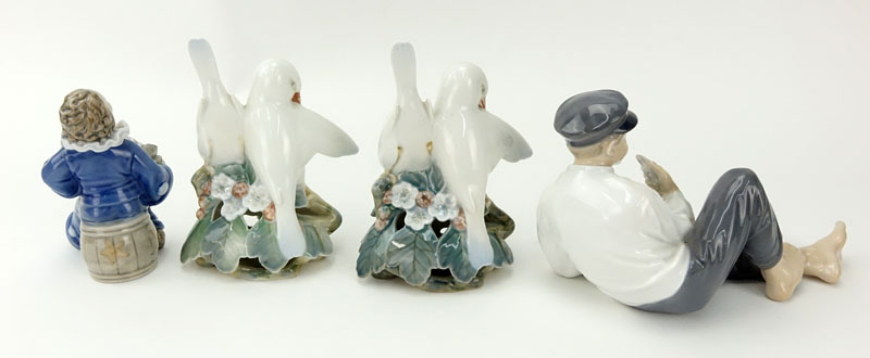 Collection of Four (4) Royal Copenhagen Figurines.