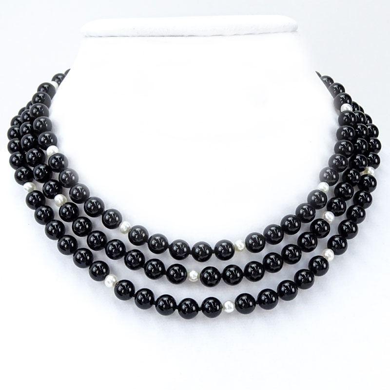 Vintage Black Onyx, Pearl and 18 Karat White Gold Three Strand Necklace. 