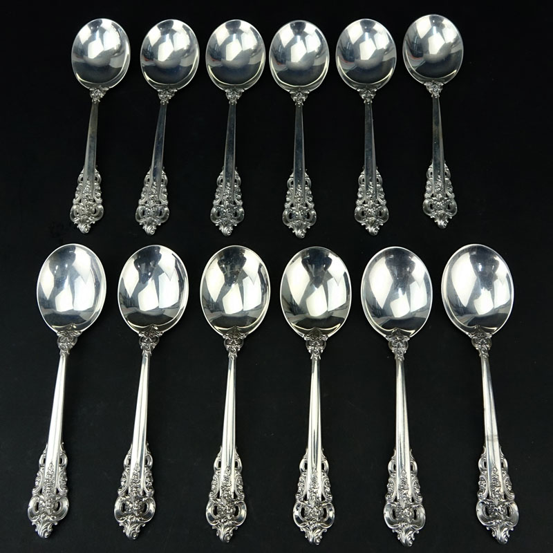 Set of Twelve (12) Wallace "Grand Baroque" Sterling Silver Round Bowl Soup Spoons. 