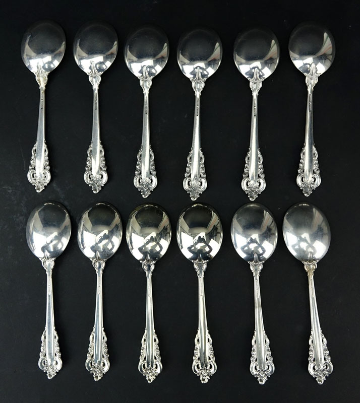 Set of Twelve (12) Wallace "Grand Baroque" Sterling Silver Round Bowl Soup Spoons. 