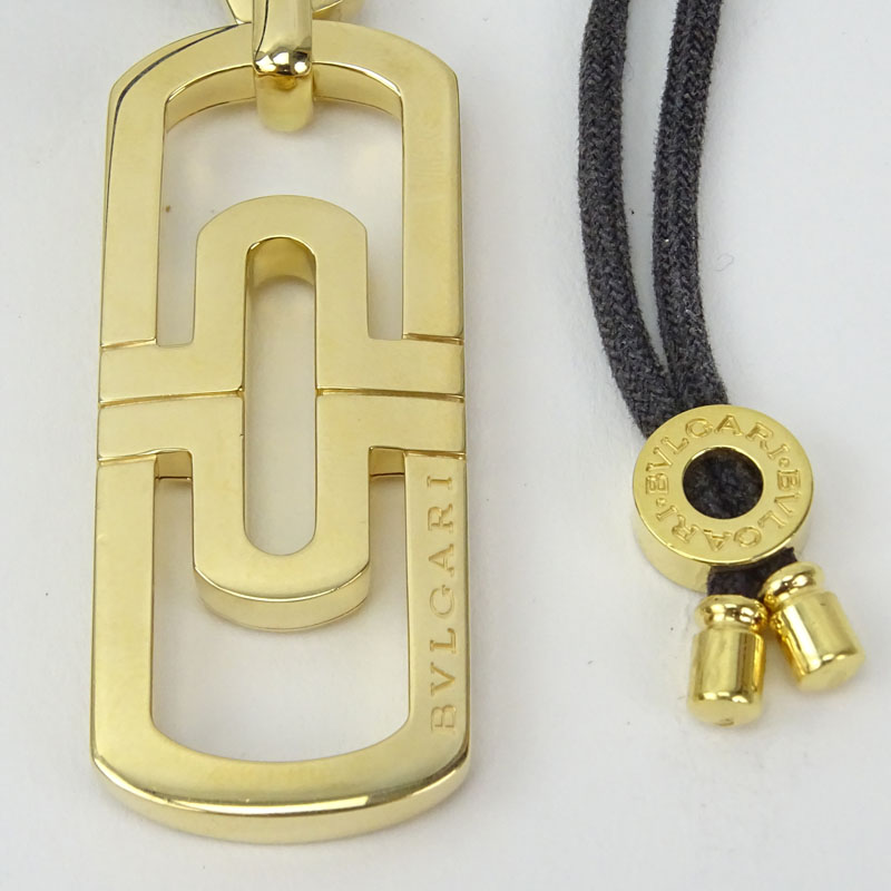 Vintage Bulgari 18 Karat Yellow Gold Parentisi Pendant Necklace on Black Cord.