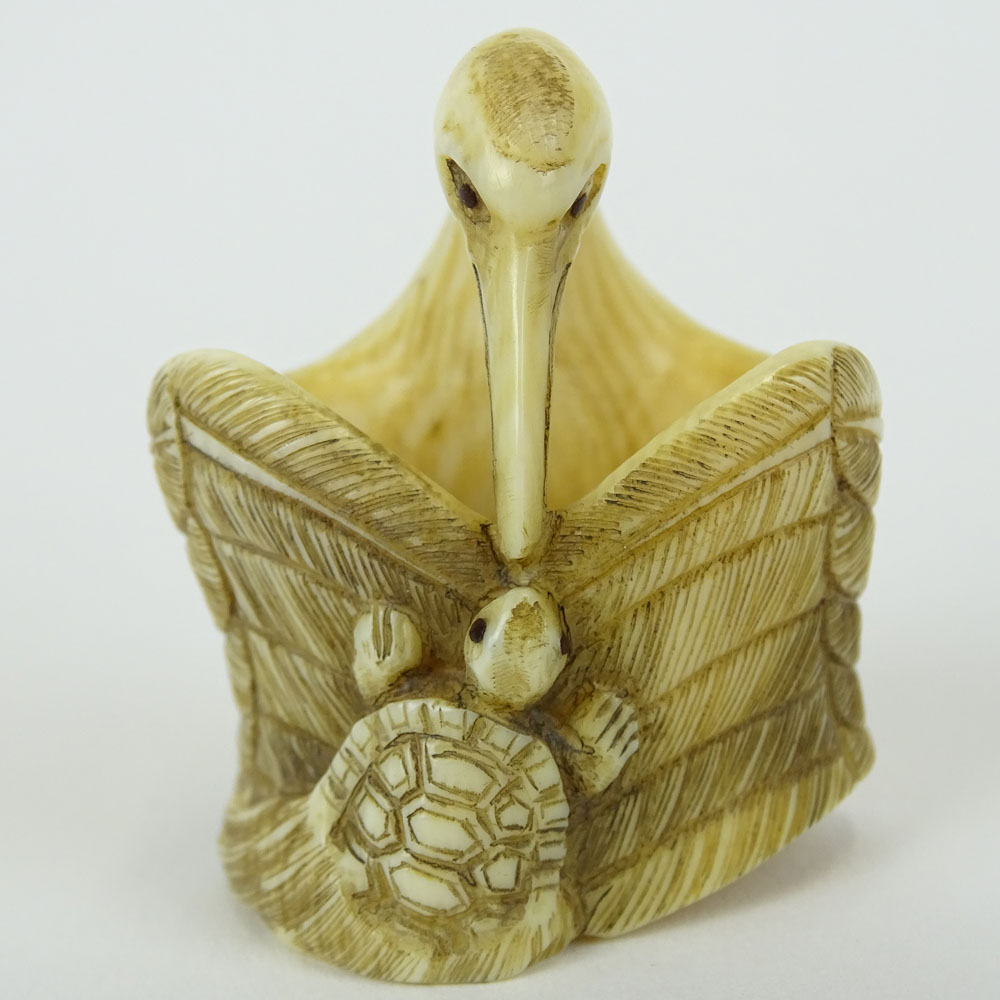 Early 20th Century Japanese Baisho Shop Carved Netsuke In The Form of a Stork and Turtle.