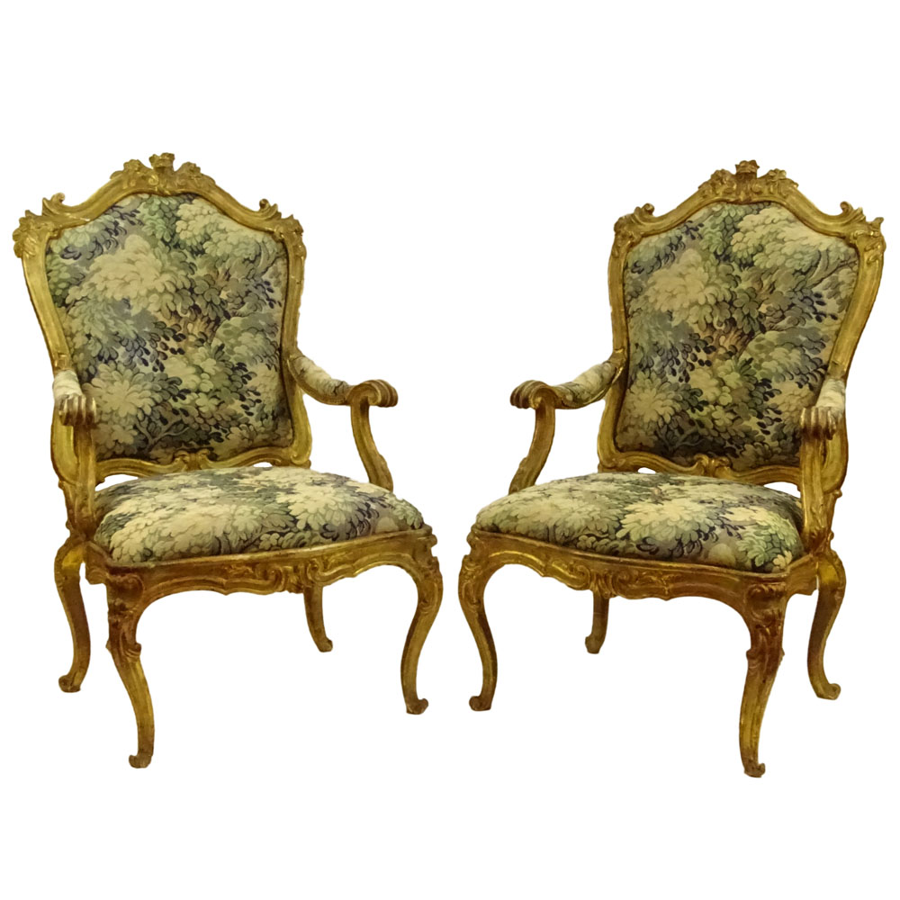 Large pair of 19th Century Italian carved and gilt wood fauteuils