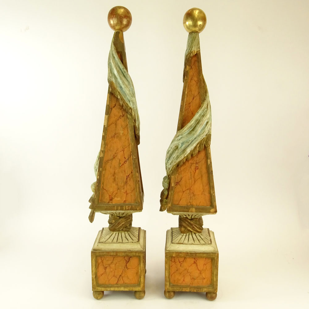 Pair of Early 20th Century Italian Carved Painted and Parcel Gilt Wood Obelisks.
