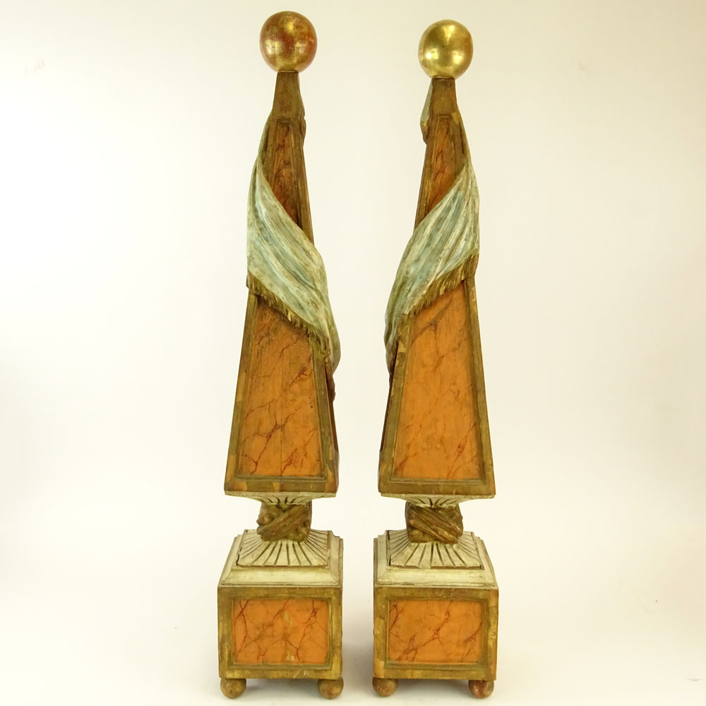 Pair of Early 20th Century Italian Carved Painted and Parcel Gilt Wood Obelisks.