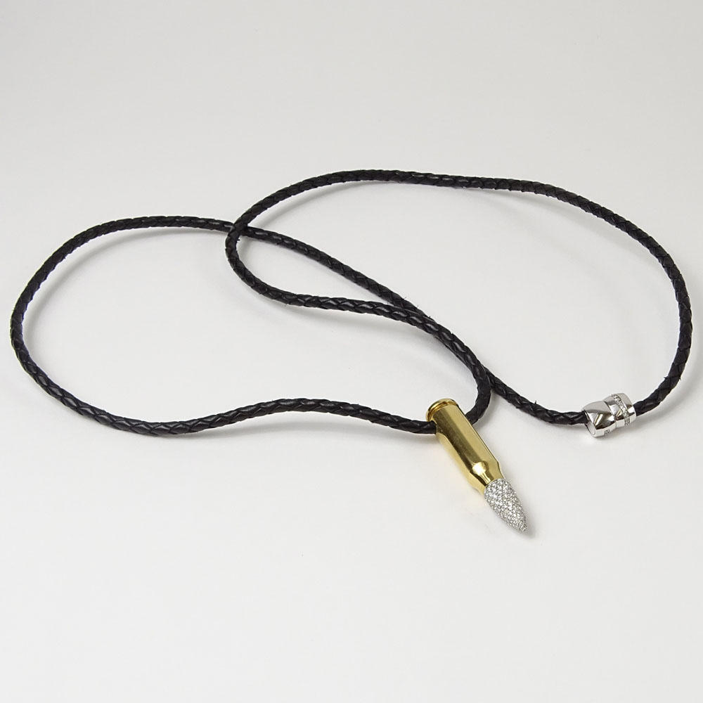 18 Karat Yellow AK-47 Bullet Pendant with 2.0 Carat Pave Set Round Cut Diamond Tip and with Braided Leather Necklace.