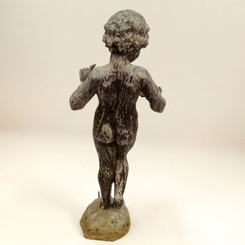 Early 20th Century Iron Figural Standing Putto holding Shell Fountain.