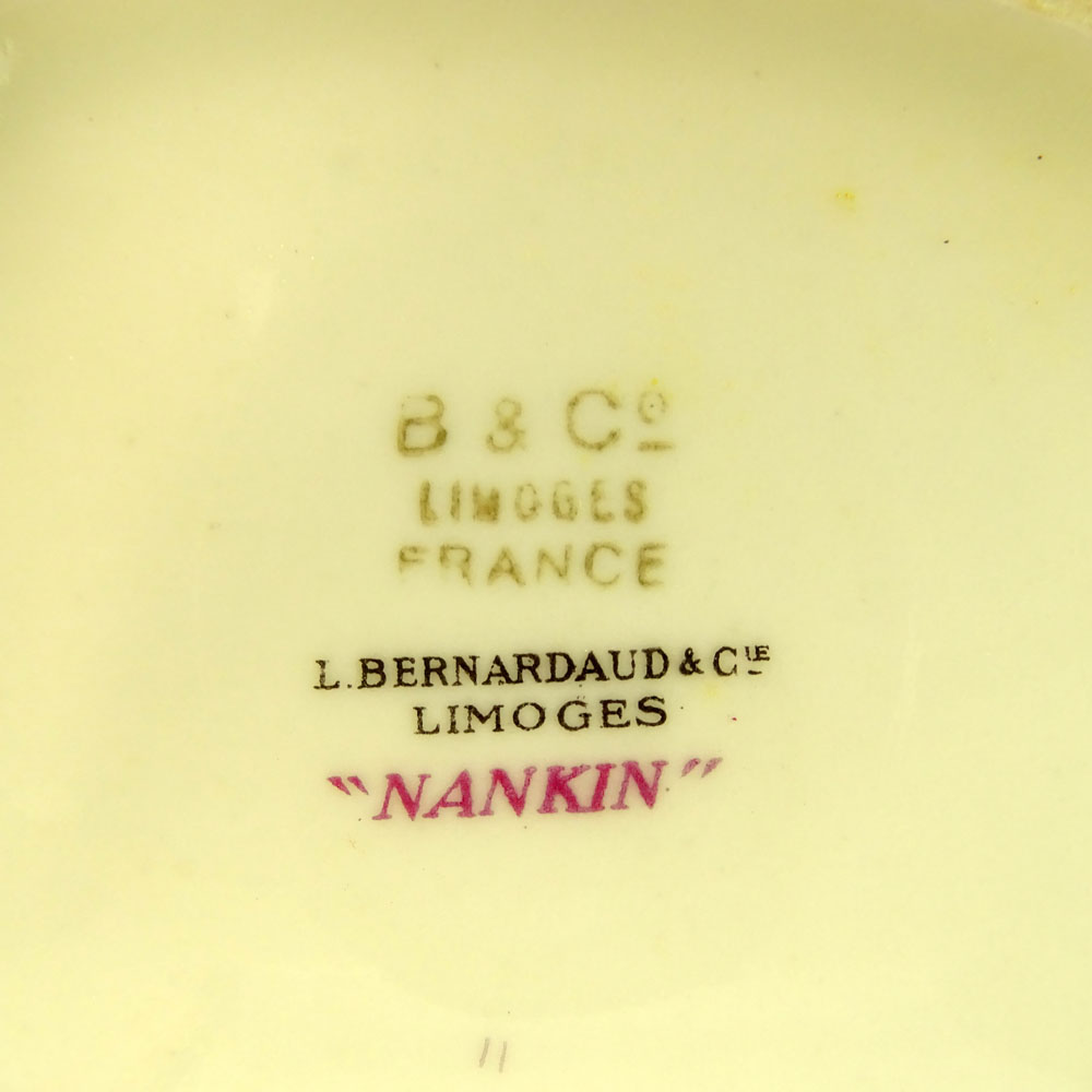 Ten (10) Mid 20th Century French Bernardaud & Cie Limoges Porcelain Dinner Plates in the "Nankin" 