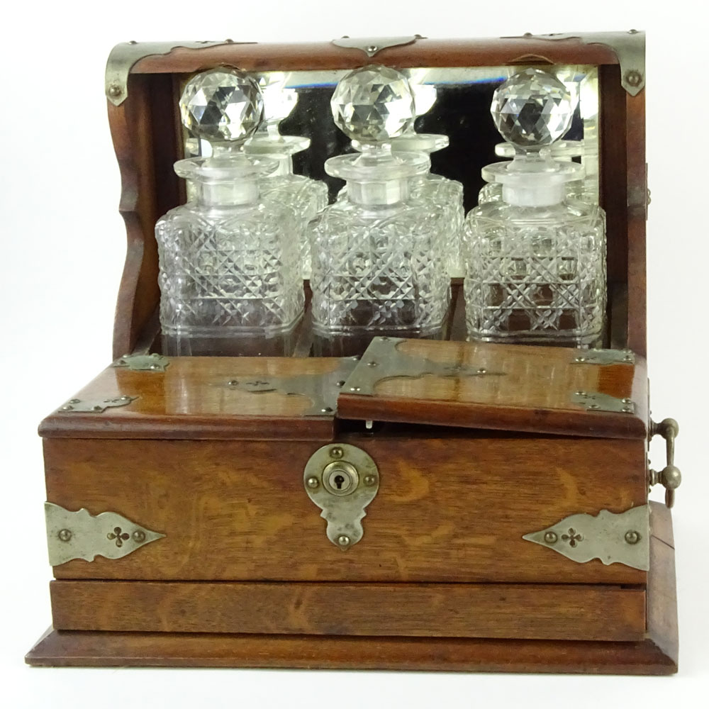 19th Century Bronze Mounted Oak Tantalus with Cut Glass Decanters.