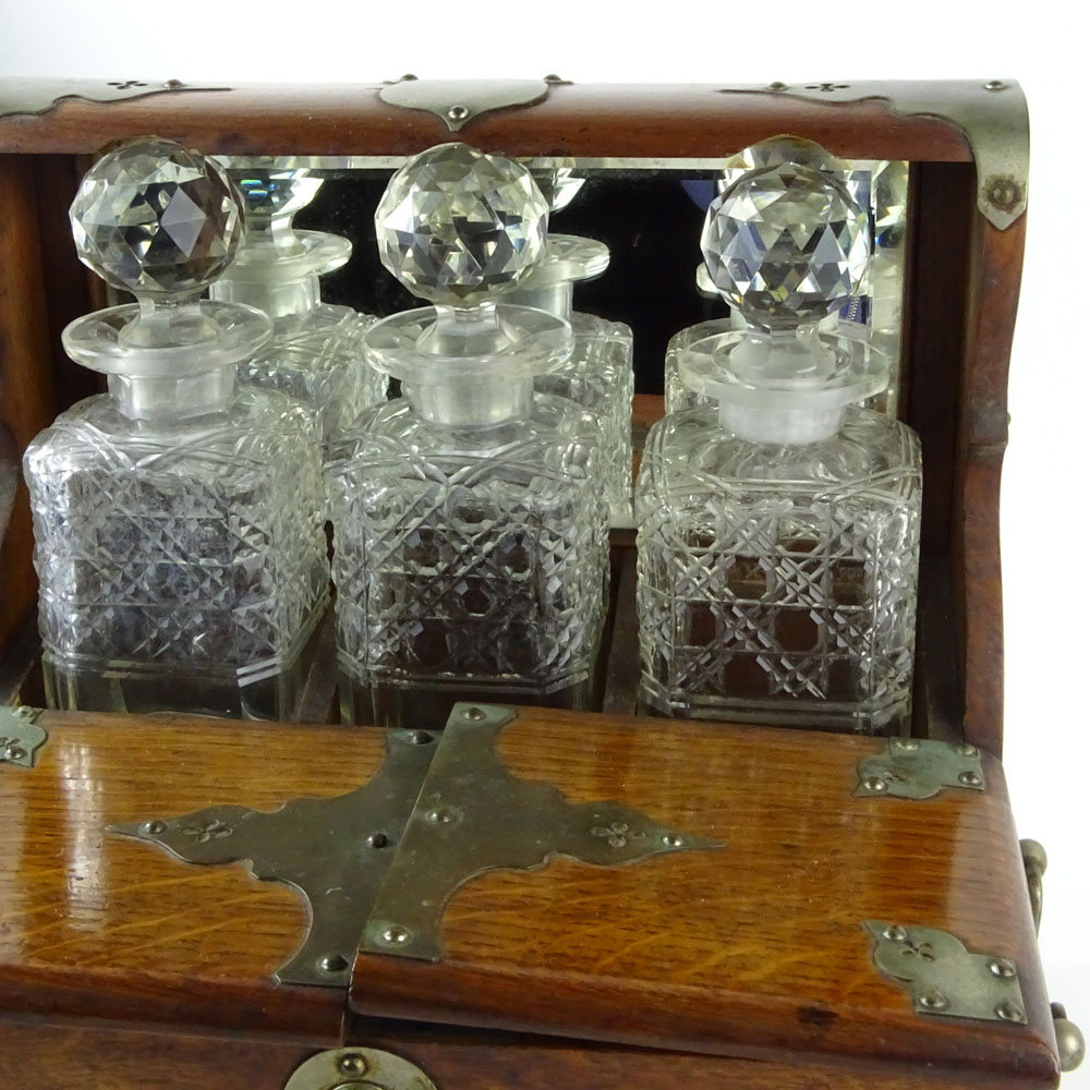 19th Century Bronze Mounted Oak Tantalus with Cut Glass Decanters.