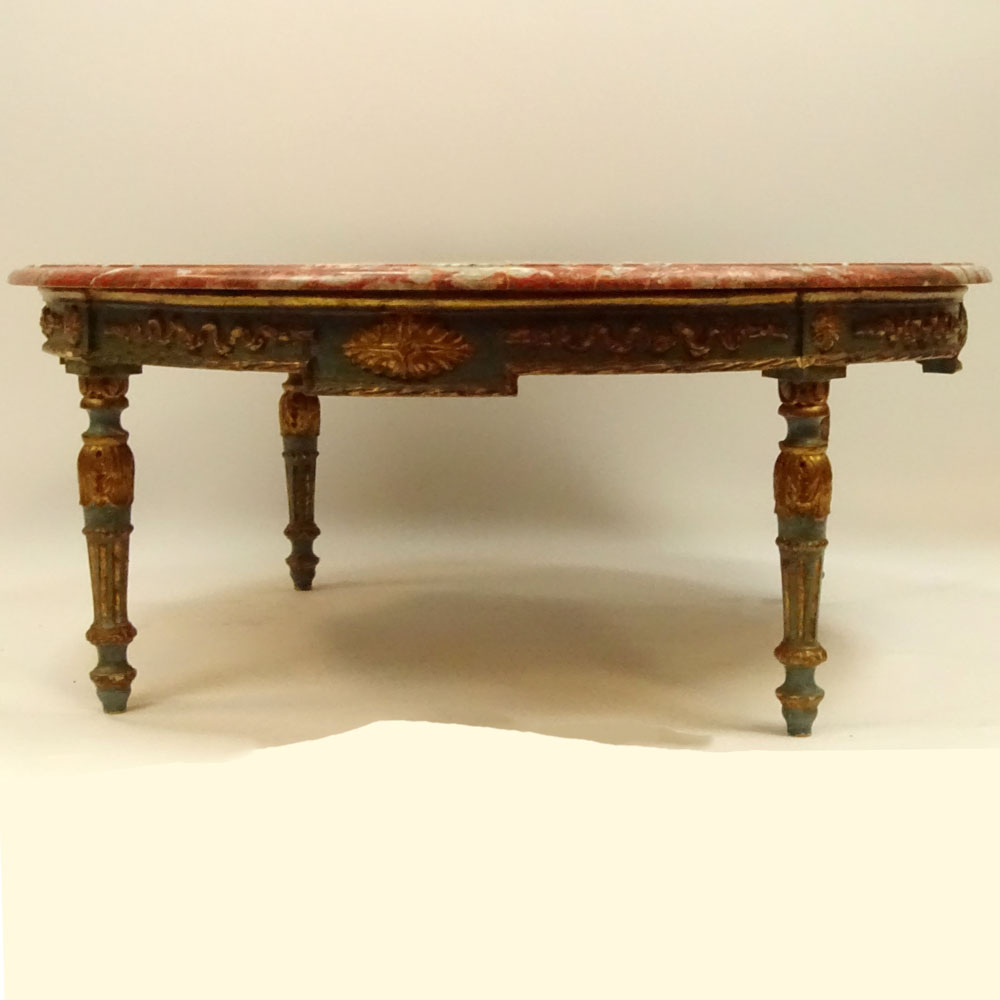 19/20th Century carved painted parcel gilt wood coffee table with marble top.