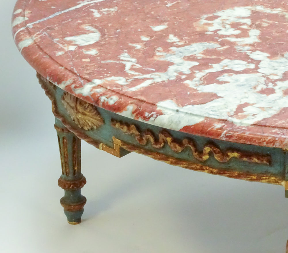 19/20th Century carved painted parcel gilt wood coffee table with marble top.